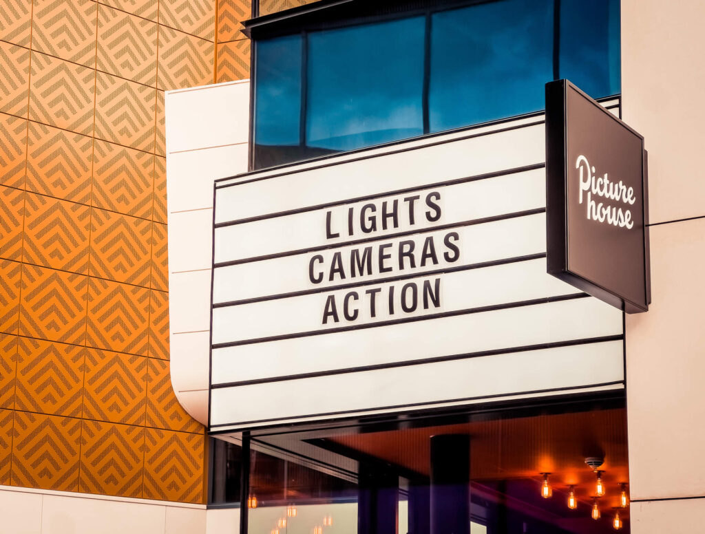 The sign outside The Picturehouse Cinema in W5 saying "Lights, Camera Action"